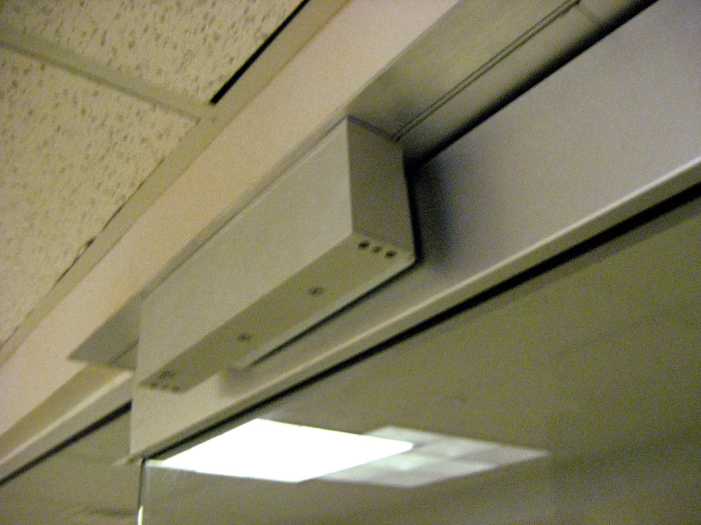 Electromagnetic lock mounted on a door frame