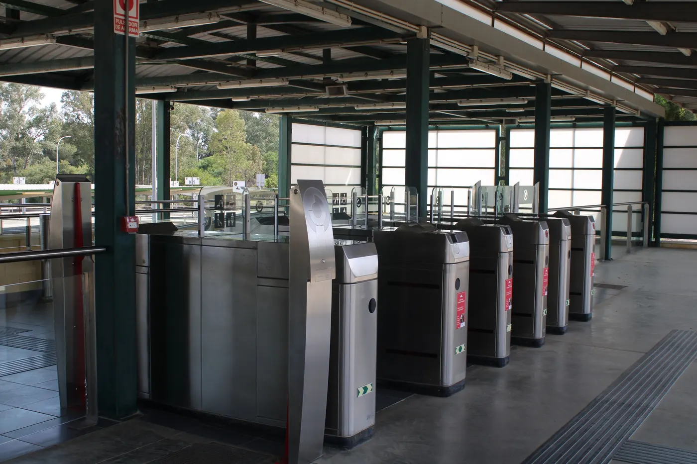 Row of access-controlled turnstiles at an entrance