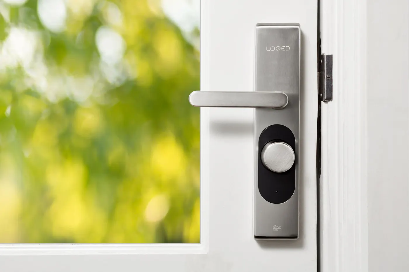 Smart door lock on a white door